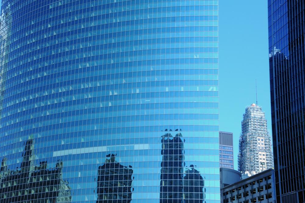 Office building with city reflection