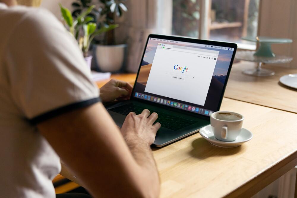Man searching on Google. 
