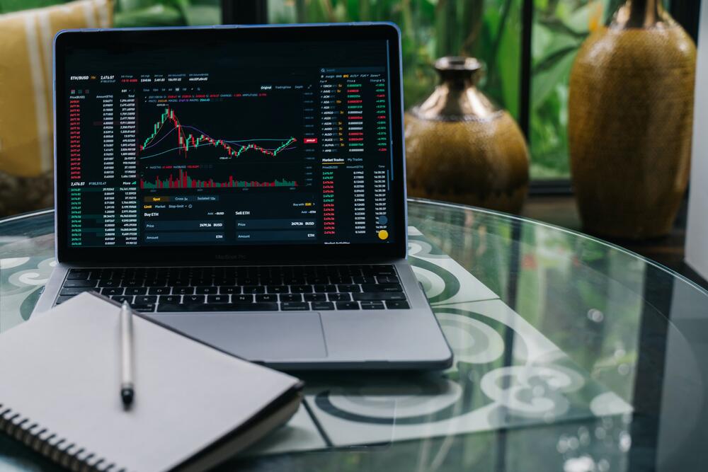 Laptop showing charts.