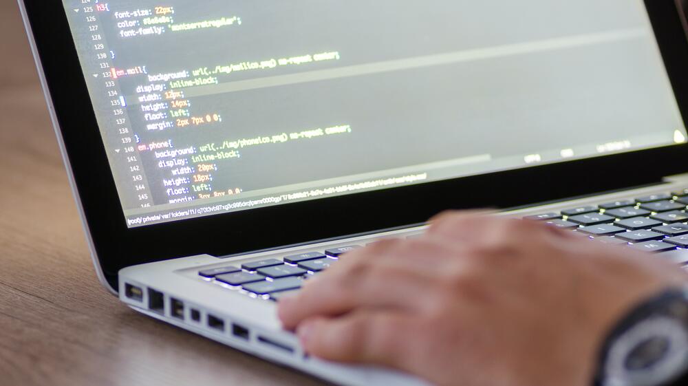 Man working on computer. 