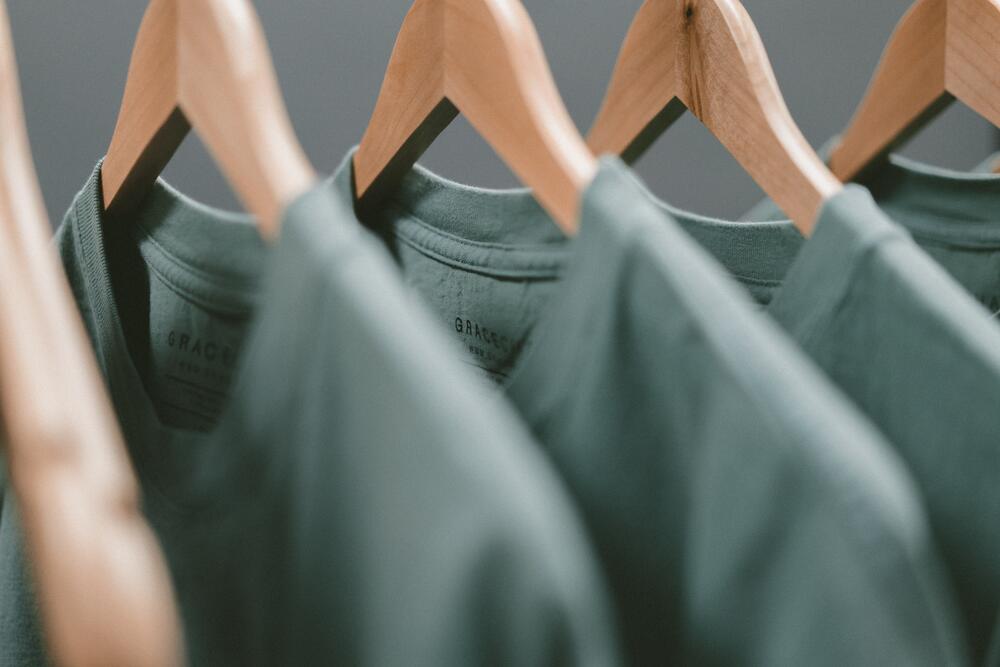 Clothing on hangers in a retail store